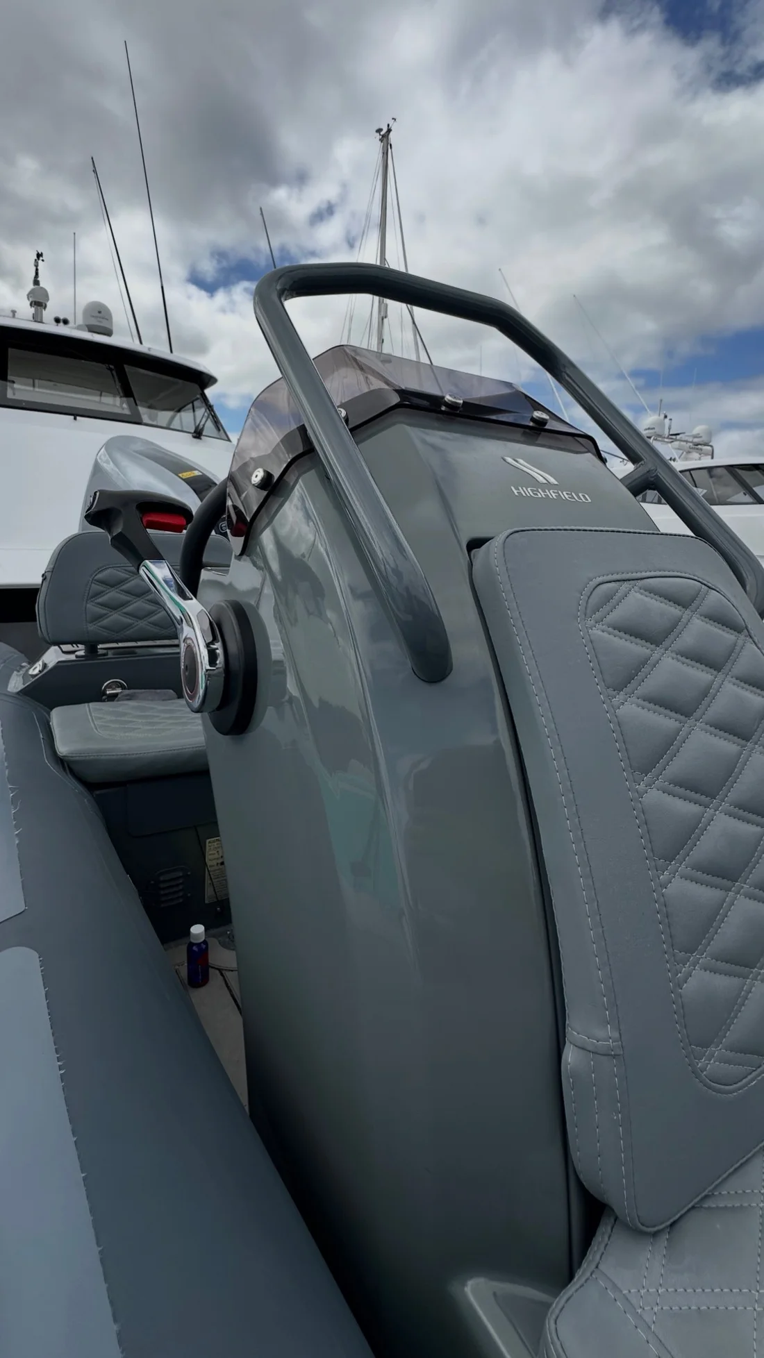 Glossy grey Highfield RIB console and helm detailed at the marina — Hull Yeah Detailing