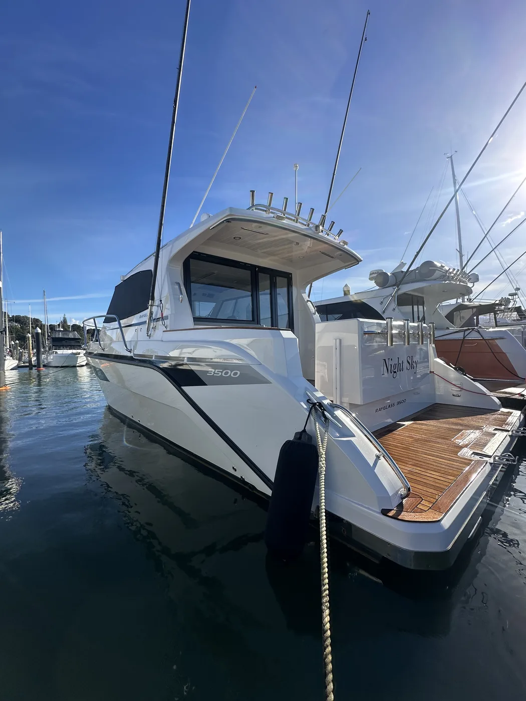 Rayglass 3500 Night Sky gleaming at the marina after a full detail — Hull Yeah Detailing