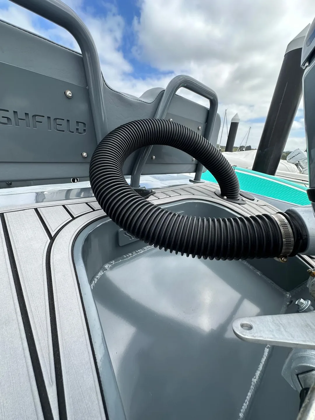 Tender deck and console vacuumed, cleaned and dressed at the marina