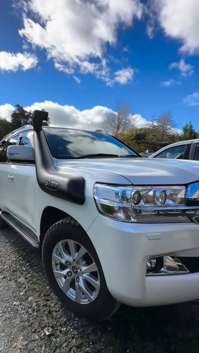 White Land Cruiser detailed — car detailing Omaha